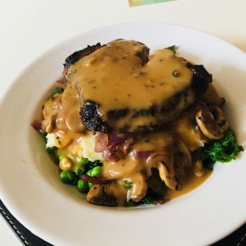 Pan-fried steak with a peppercorn sauce